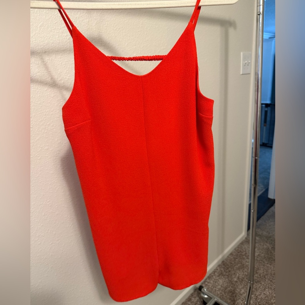 Vibrant orange shorts romper